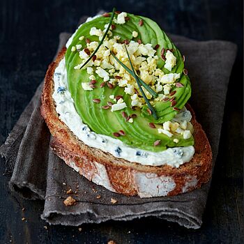 Picture of an avocado toast with saint Agur Creme 